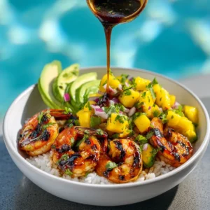 An overhead shot of a fresh shrimp and avocado bowl, highlighting the colorful ingredients like cherry tomatoes, corn, and creamy avocado.